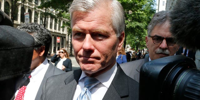 May 12, 2015: Former Virginia Gov. Bob McDonnell navigates a group of cameras as he leaves the 4th U.S. Circuit Court of Appeals after a hearing the appeal of his corruption conviction in Richmond, Va. (AP)