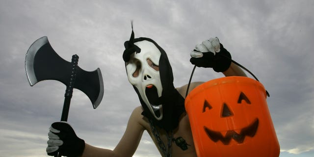 SYDNEY, AUSTRALIA - OCTOBER 31: A young boy poses in costume before trick or treating on Halloween Day in North Bondi on October 31, 2008 in Sydney, Australia. Halloween, also known as Hallowe'en and shortened from its original form of All Hallows' Even, is internationally celebrated on October 31 and originates from the ancient Celtic festival of Samhain, which was a celebration recognising the end of the harvest in Gaelic culture. (Photo by Sergio Dionisio/Getty Images)