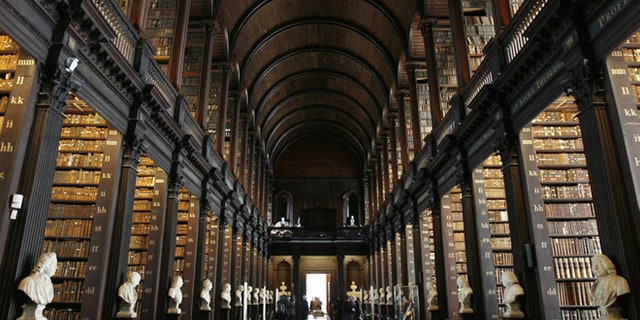 Illustration picture shows the library of the Trinity college, 09 October 2007 during Belgium's King Albert and Queen Paola's official state visit to Ireland. The Belgian royals are in Ireland on a three-day official state visit. AFP PHOTO / BELGA / BENOIT DOPPAGNE (Photo credit should read BENOIT DOPPAGNE/AFP/Getty Images)