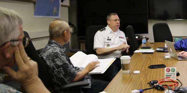 Major Gen. Arthur "Joe" Logan (center), Hawaii’s adjutant general, director of the Hawaii Emergency Management Agency and director of the Office of Homeland Security, meets with emergency planning team members.