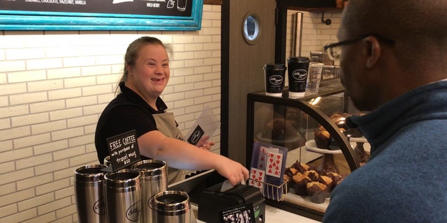 Trista Kutcher is taking orders and working the cash register.