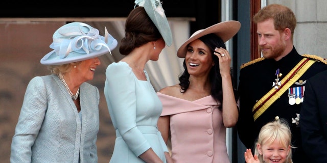 From left, Camilla Duchess of Cornwall,Kate Duchess of Cambridge, Meghan Duchess of Sussex and Prince Harry, on the balcony of Buckingham Palace, in central London, following the Trooping the Colour ceremony.