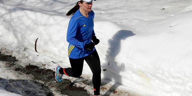 Feb. 27, 2015: Becca Pizzi trains for the Boston Marathon along Heartbreak Hill in Newton, Mass. Pizzi, a veteran of 45 marathons, vies to be the first American woman to complete the World Marathon Challenge -- seven marathons in seven days on seven continents -- in January 2016. (AP)
