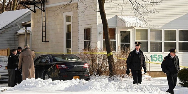 The victims were found dead in a basement apartment.