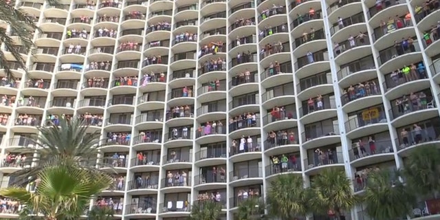 Dozens of hotel guests greet the day to an iconic animated movie song.