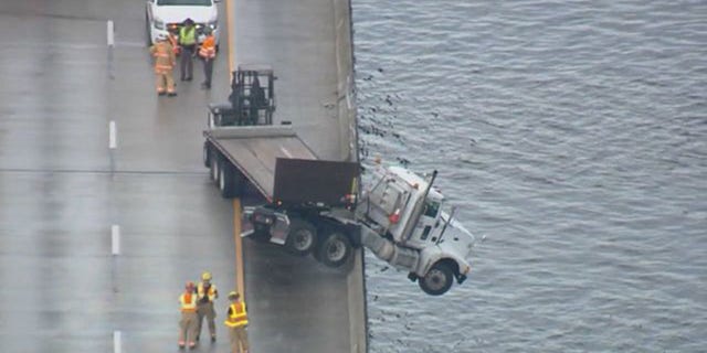 Authorities said the truck driver got out safely and there were no reports of injuries.