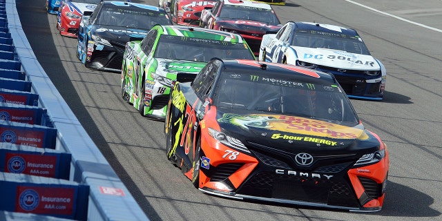 Truex leads the field at Fontana on the way to a flag to flag win.
