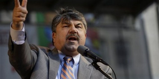 AFL-CIO President Richard Trumka gestures while speaking at a rally near City Hall April 29 in New York.