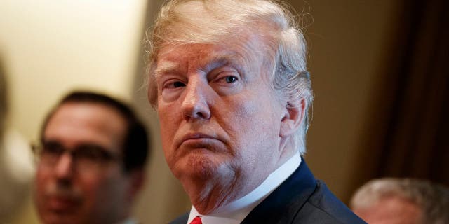 FILE - In this June 20, 2018 file photo, President Donald Trump listens during a meeting with Republican members of Congress on immigration in the Cabinet Room of the White House in Washington. The separation of families at the U.S.-Mexico border caught the attention of the world and prompted mass outrage, but it only tells a small part of the story surrounding the Trump administrationââ¬â¢s immigration policy. (AP Photo/Evan Vucci, file)