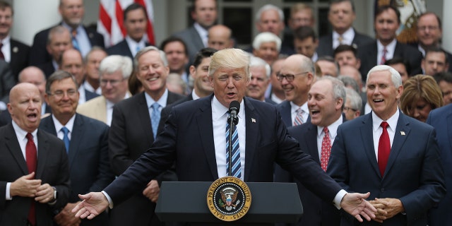 President Trump gathers with Vice President Mike Pence and Congressional Republicans in the Rose Garden of the White House after the House of Representatives approved the American Healthcare Act to repeal major parts of Obamacare and replace it with the Republican healthcare plan, on May 4, 2017.