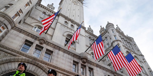 Police stand guard outside the Trump International Hotel on Pennsylvania Avenue in Washington in this January file photo.