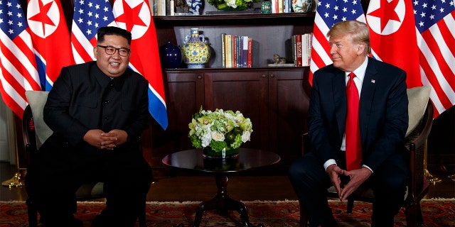 President Donald Trump meets with North Korean leader Kim Jong Un on Sentosa Island, Tuesday, June 12, 2018, in Singapore.