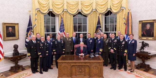 President Donald Trump welcomes Pentagon officials to the Oval Office, Oct. 5, 2017.