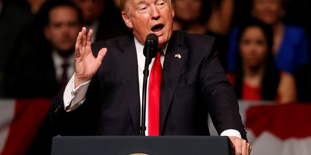 U.S. President Donald Trump announces his Cuba policy at the Manuel Artime Theater in the Little Havana neighborhood in Miami, Florida, U.S. June 16, 2017. REUTERS/Joe Skipper - RC1B842281F0