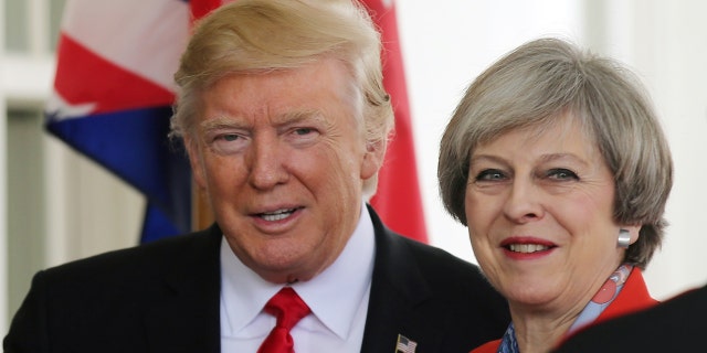 Jan. 27, 2017: U.S. President Donald Trump greets British Prime MinisterTheresa May as she arrives at the White House in Washington.