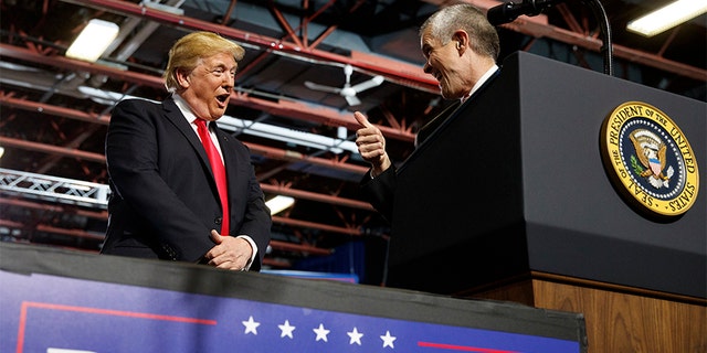 President Donald Trump, seen on July 5, looks to GOP Senate candidate Matt Rosendale during a rally in Great Falls, Montana.