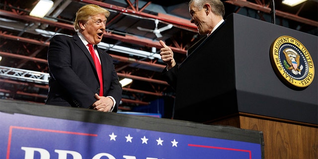 President Donald Trump, seen on July 5, looks to GOP Senate candidate Matt Rosendale during a rally in Great Falls, Montana.