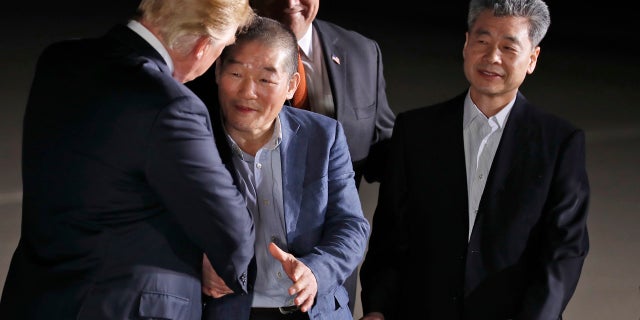 President Donald Trump is seen shaking the hands of one of the three American's released from North Korea at Andrews Air Force Base in Maryland early Thursday.