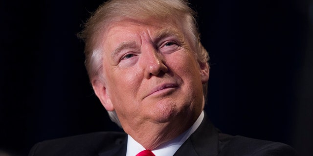 President Donald Trump listens as he is introduced during the National Prayer Breakfast, Thursday, Feb. 2, 2017, in Washington. (AP Photo/Evan Vucci)