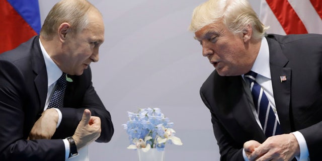 President Donald Trump meets with Russian President Vladimir Putin at the G20 Summit, Friday, July 7, 2017, in Hamburg. (AP Photo/Evan Vucci)