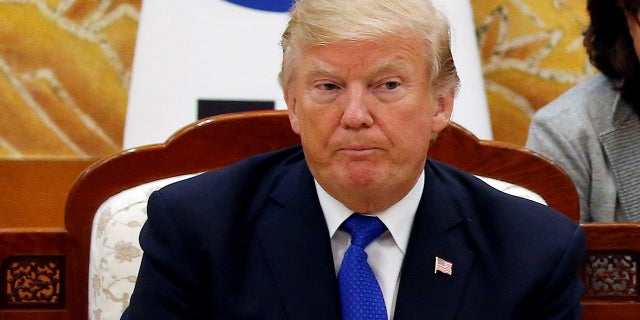 President Donald Trump and South Koreas President Moon Jae-in meet at South Koreas presidential Blue House in Seoul, South Korea, Nov. 7, 2017. In an Oval Office meeting, he asked a South Korean American expert in hostage policy where her "people" were from.