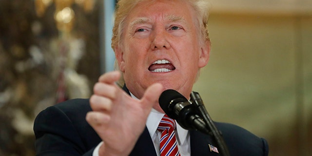 President Donald Trump speaks to the media in the lobby of Trump Tower, Tuesday, Aug. 15, 2017 in New York. (AP Photo/Pablo Martinez Monsivais)
