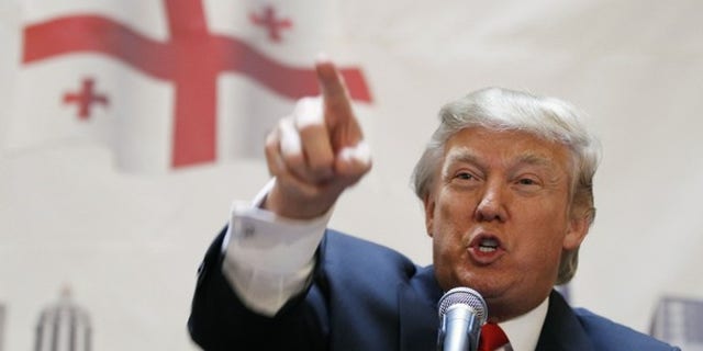 Donald Trump speaks to the press at a news conference in New York in this March 10, 2011 file photo. (Reuters)