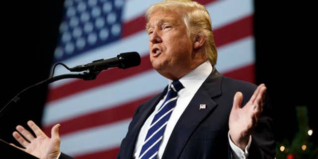 FILE -- In this Dec. 13, 2016, photo, President-elect Donald Trump speaks during a rally at the Wisconsin State Fair Exposition Center in West Allis, Wis.