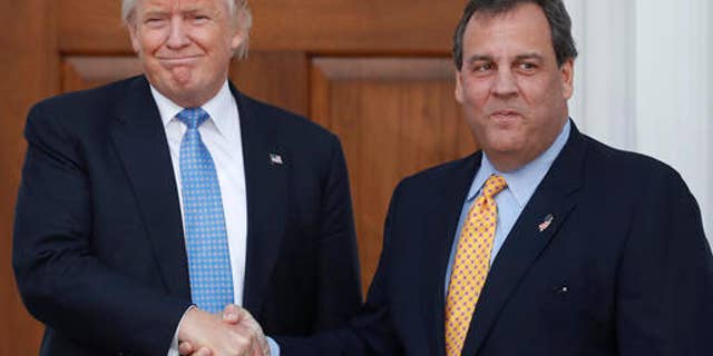 President-elect Donald Trump, left, and New Jersey Gov. Chris Christie shake hands at the Trump National Golf Club Bedminster clubhouse, Sunday, Nov. 20, 2016, in Bedminster, N.J.. (AP Photo/Carolyn Kaster)