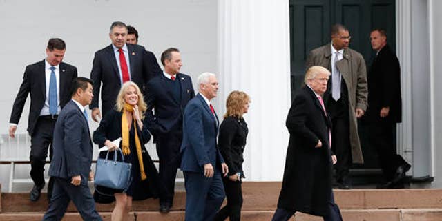 President-elect Donald Trump, foreground from right, Charlotte Pence, Vice President-elect Mike Pence, incoming White House Chief of Staff Reince Priebus and Kellyanne Conway leave services at Lamington Presbyterian Church in Bedminster, N.J., Sunday, Nov. 20, 2016. (AP Photo/Carolyn Kaster)