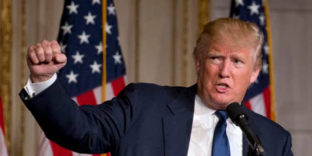 Republican presidential candidate Donald Trump speaks during the Palm Beach County GOP Lincoln Day Dinner at the Mar-A-Lago Club, Sunday, March 20, 2016, in Palm Beach, Fla. (AP Photo/Wilfredo Lee)
