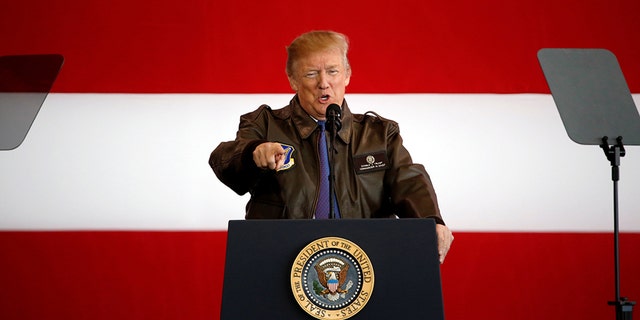U.S. President Donald Trump addresses members of U.S. military and Japan Self-Defense Force (JSDF) at U.S. Air Force Yokota Air Base in Fussa, outside Tokyo, Nov. 5, 2017.