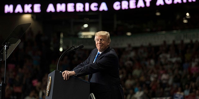 President Donald Trump pauses as he speaks during a rally, Tuesday, July 25, 2017, at the Covelli Centre in Youngstown, Ohio (AP Photo/Carolyn Kaster)