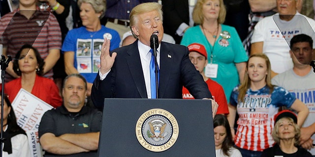 President Donald Trump speaks during a rally at the Covelli Centre, Tuesday, July 25, 2017, in Youngstown, Ohio. (AP Photo/Tony Dejak)