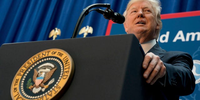 In this Friday, June 9, 2017, photo, President Donald Trump speaks on infrastructure at the Department of Transportation in Washington. Trump is expected to outline his new policy with Cuba next week, announcing steps that could reverse some of the changes made by former President Barack Obama to open commerce and travel after a half-century standoff with the communist island. (AP Photo/Andrew Harnik)