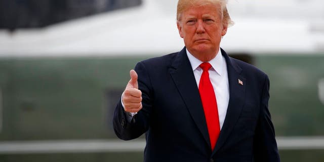 President Donald Trump boards Air Force One for a trip to New York to discuss immigration policy, Wednesday, May 23, 2018, in Andrews Air Force Base, Md. (AP Photo/Evan Vucci)