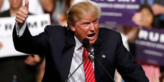 Republican presidential candidate Donald Trump finishes up speaking before a crowd of 3,500 Saturday, July 11, 2015, in Phoenix. (AP Photo/Ross D. Franklin)