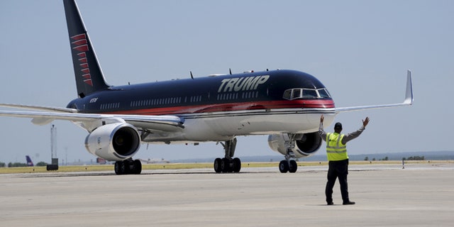 July 23, 2015: Republican presidential candidate Donald Trump arrives on his signature plane in Laredo, Texas.