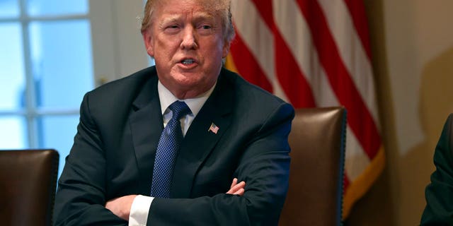 President Donald Trump speaks in the Cabinet Room of the White House in Washington, Monday, April 9, 2018.