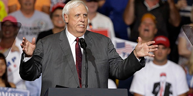 West Virginia Gov. Jim Justice speaks during a rally Thursday, Aug. 3, 2017, in Huntington, W.Va. Justice, a Democrat, announced that he is switching parties to join the Republicans. (AP Photo/Darron Cummings)