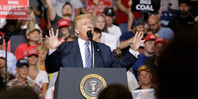 President Donald Trump speaks during a rally Thursday, Aug. 3, 2017, in Huntington, W.Va. (AP Photo/Darron Cummings)