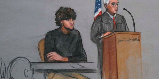 Jan. 5, 2015: Boston Marathon bombing suspect Dzhokhar Tsarnaev, left, is depicted beside U.S. District Judge George O'Toole Jr., right, as O'Toole addresses a pool of potential jurors in a jury assembly room at the federal courthouse, in Boston.