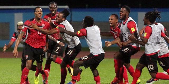 Alvin Jones celebrates his first-half goal that put Trinidad up 2-0 over the U.S.