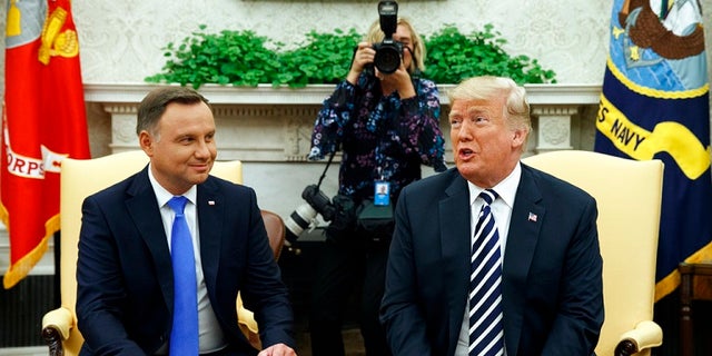 President Trump and Polish President Andrzej Duda in the Oval Office on Tuesday.