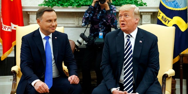 President Trump and Polish President Andrzej Duda in the Oval Office on Tuesday.