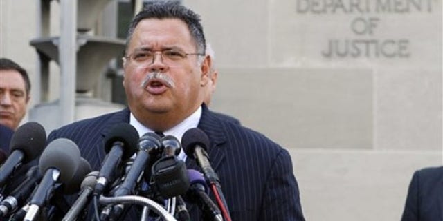 Tucson Police Chief Roberto Villasenor talks to reporters May 26 following a meeting between police chiefs and Attorney General Eric Holder in Washington. (AP Photo)
