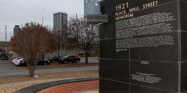 A memorial to Tulsa's Black Wall Street sits outside the Greenwood Cultural Center on the outskirts of downtown Tulsa, Oklahoma.