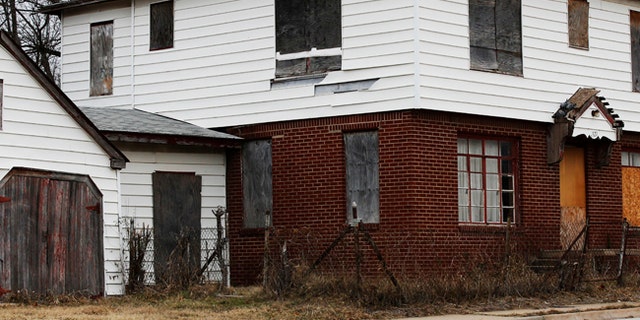 A boarded-up home is seen in north Tulsa, Okla., in December 2016.