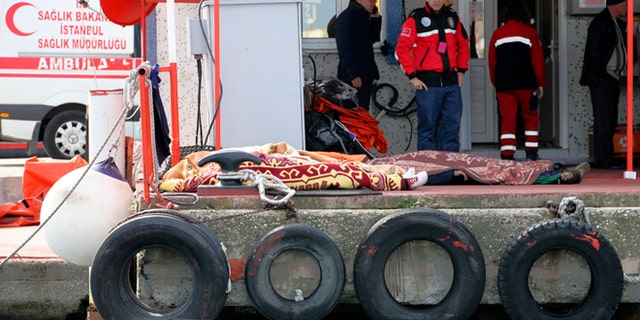 Nov. 3, 2014: Dead bodies covered with blankets lie on the ground after a boat carrying suspected migrants from Afghanistan and Syria sank just north of the Bosphorus Strait off the coast of Istanbul, Turkey, leaving at least 24 people dead and several people missing. Seven people were rescued, Turkish authorities said.