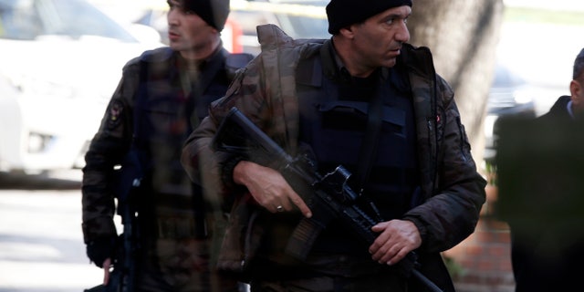 Police patrol the Sultanahmet district after an explosion.